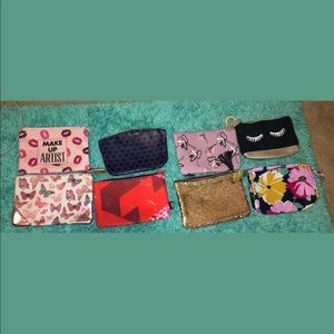 Variety of Ipsy and small beauty bags